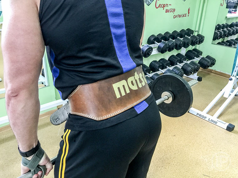 болит спина после гирь что это